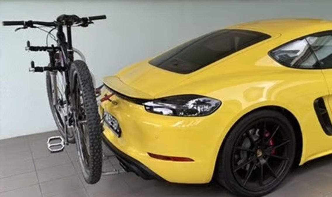 OEM quality Bike Racks & eBike Racks for ALL Porsche Caymans. 3 minute on/off. Stores inTrunk. No cut, drill, removals to install under car parts. Inconspicuous